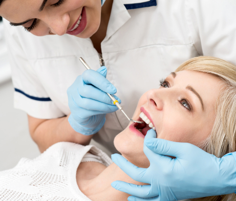 Doctor Cercek examining dental patient