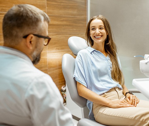 woman talking to cosmetic dentist in Reno 