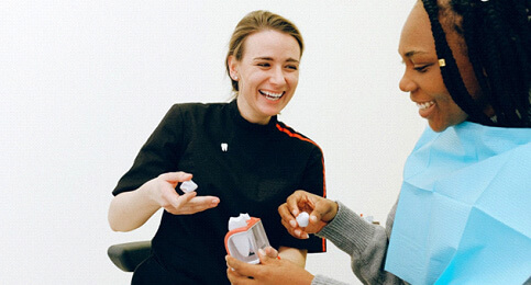 dentist discussing dental crown with patient