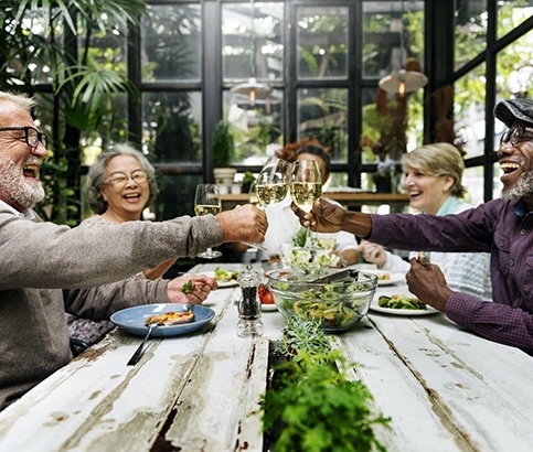 friends enjoying a meal outside 