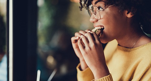 person eating a cookie 