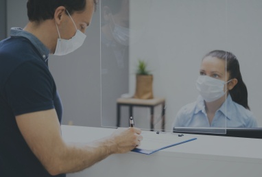 Patient filling out dental insurance forms