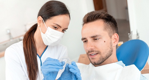 Man at the dentist for Invisalign in Reno