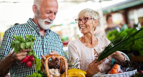 older couple shopping for healthy food  