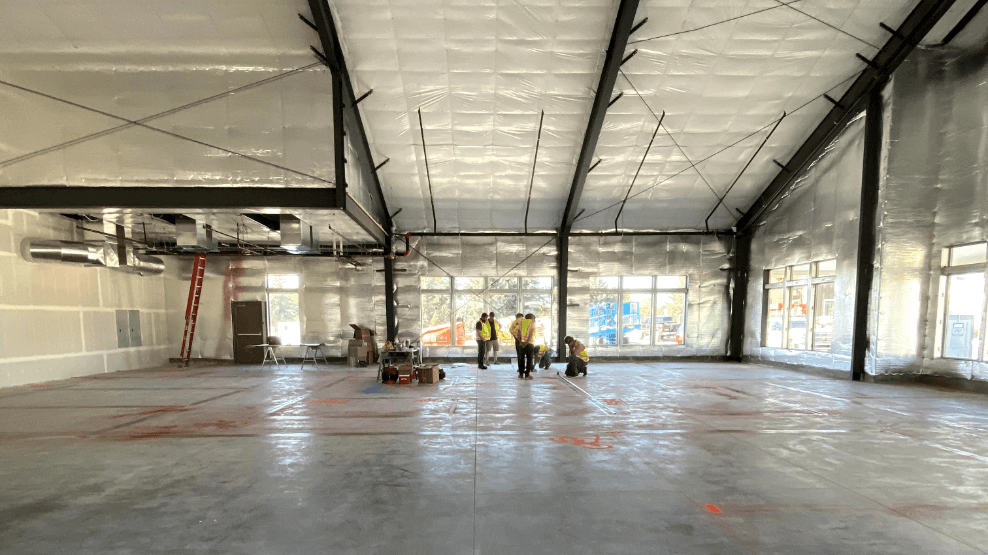 Construction team working on new dental office building