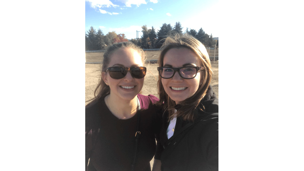 Two dental team members at dental office construction site