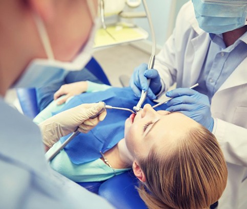 a patient undergoing dental implant salvage treatment