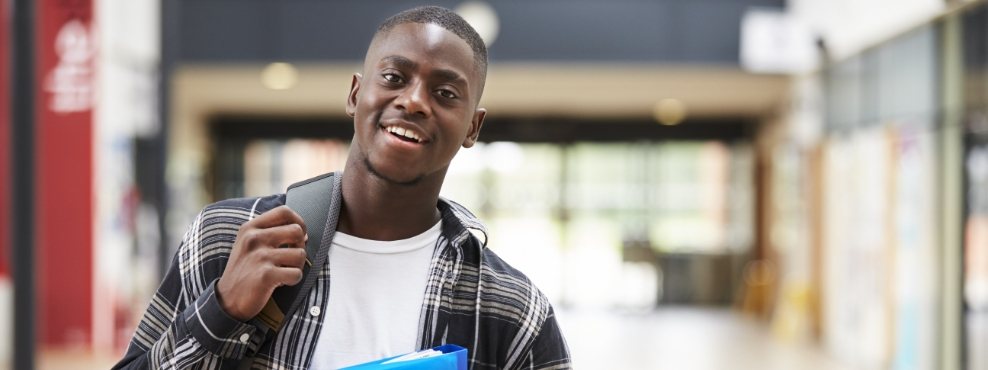 Young man with healthy smile after restorative dentistry