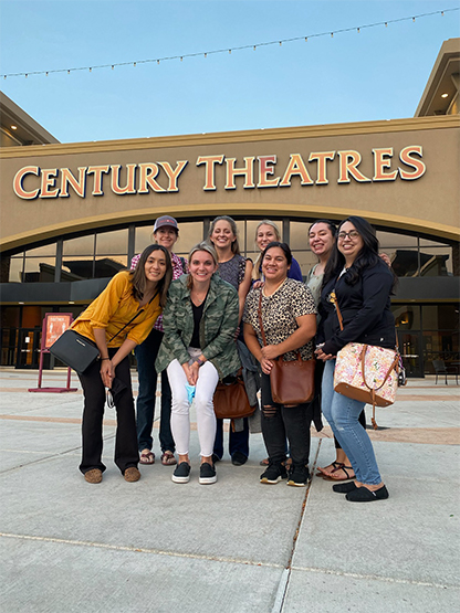 Dental team members at movie theatre